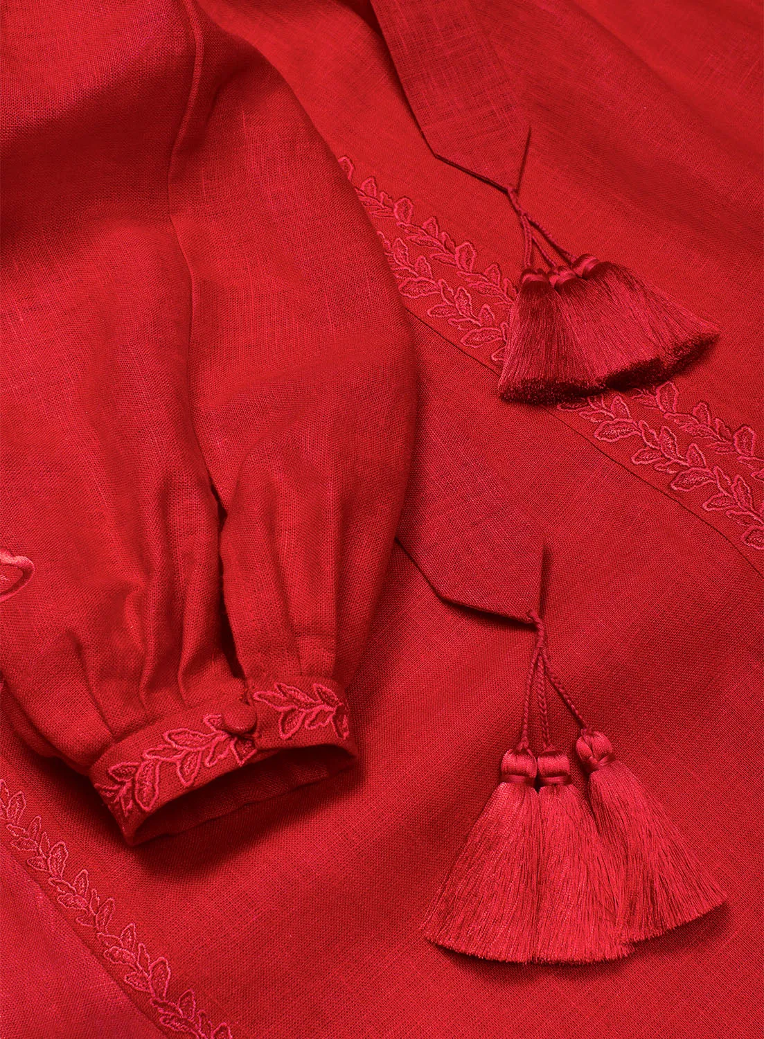 Red cut-embroidered dress with roses