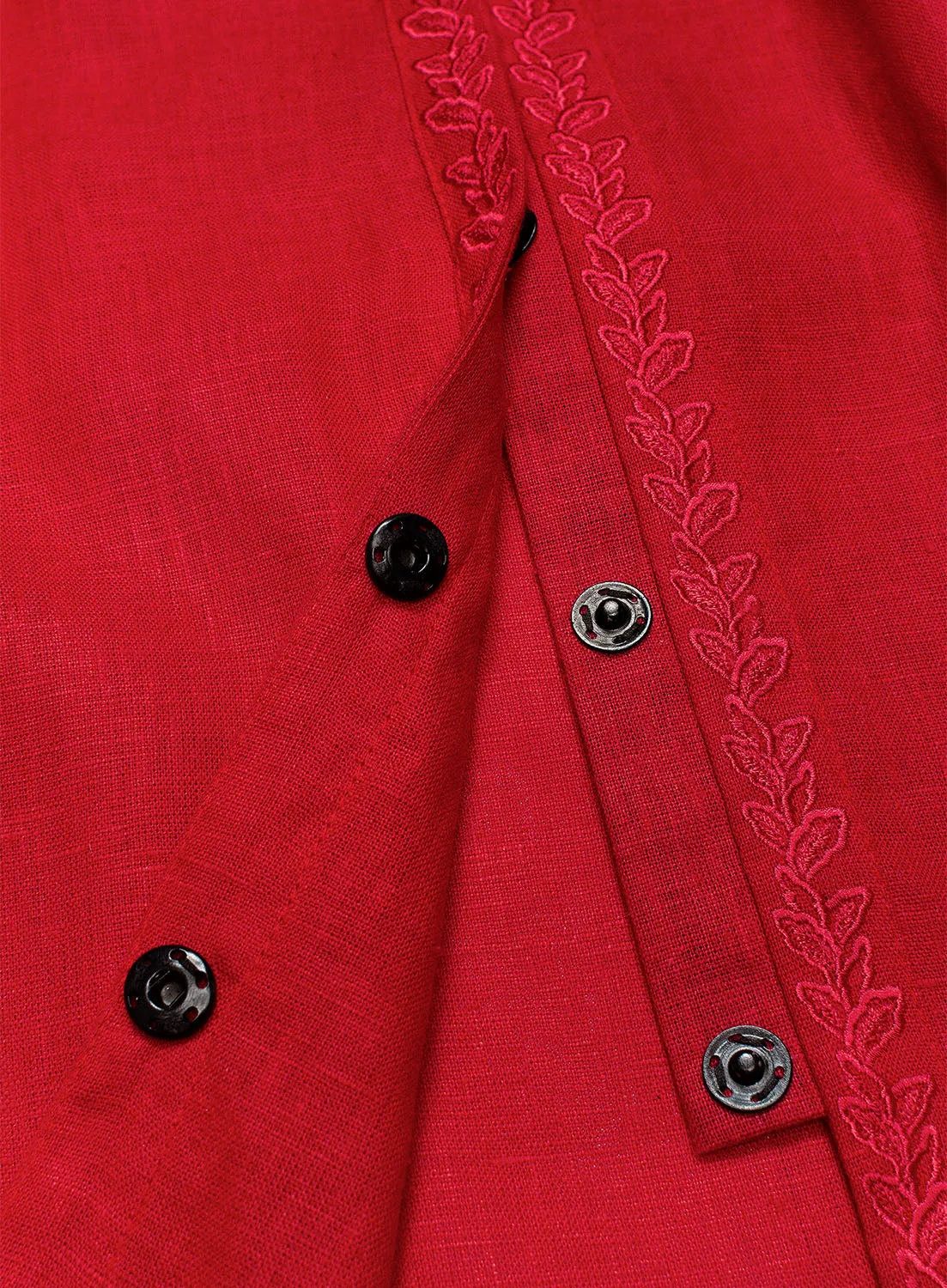 Red cut-embroidered dress with roses