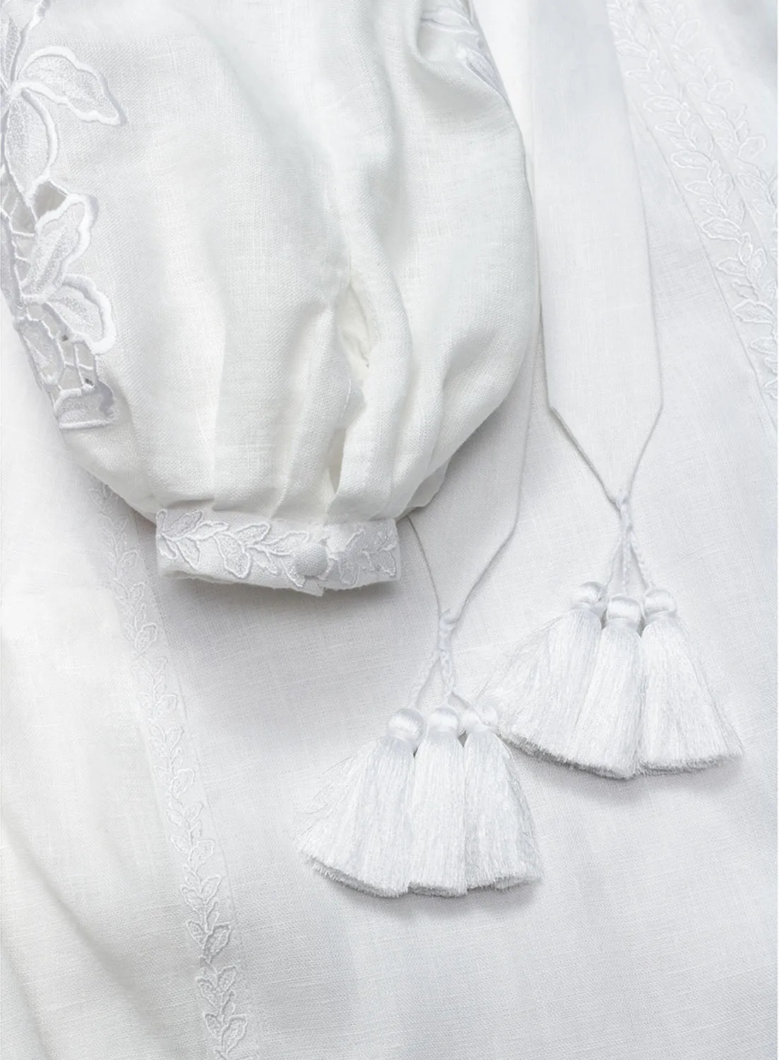 White cut-embroidered dress with roses